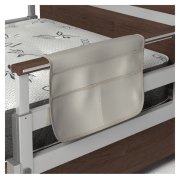 A bed caddy hanging off the side of a single product wooden bed rail.