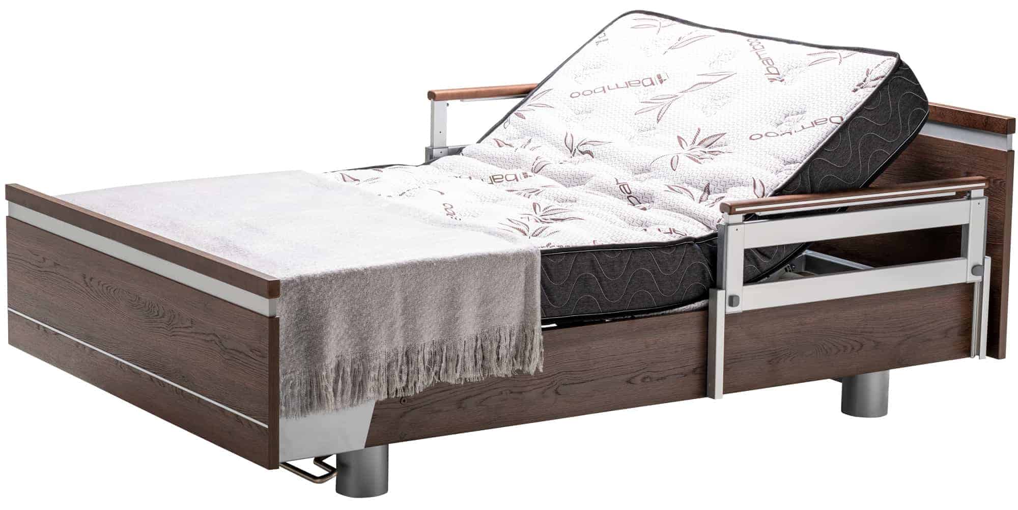 a bed with a mattress and a pull out bed frame.