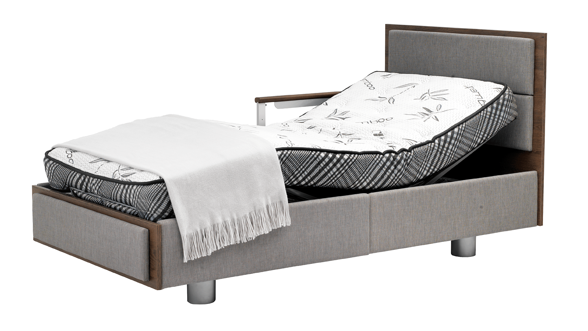 An adjustable hospital bed with a floral patterned mattress, partially reclined, and draped with a white fringed blanket, isolated on a white background. Featuring AuraPLAT39 for enhanced comfort and support