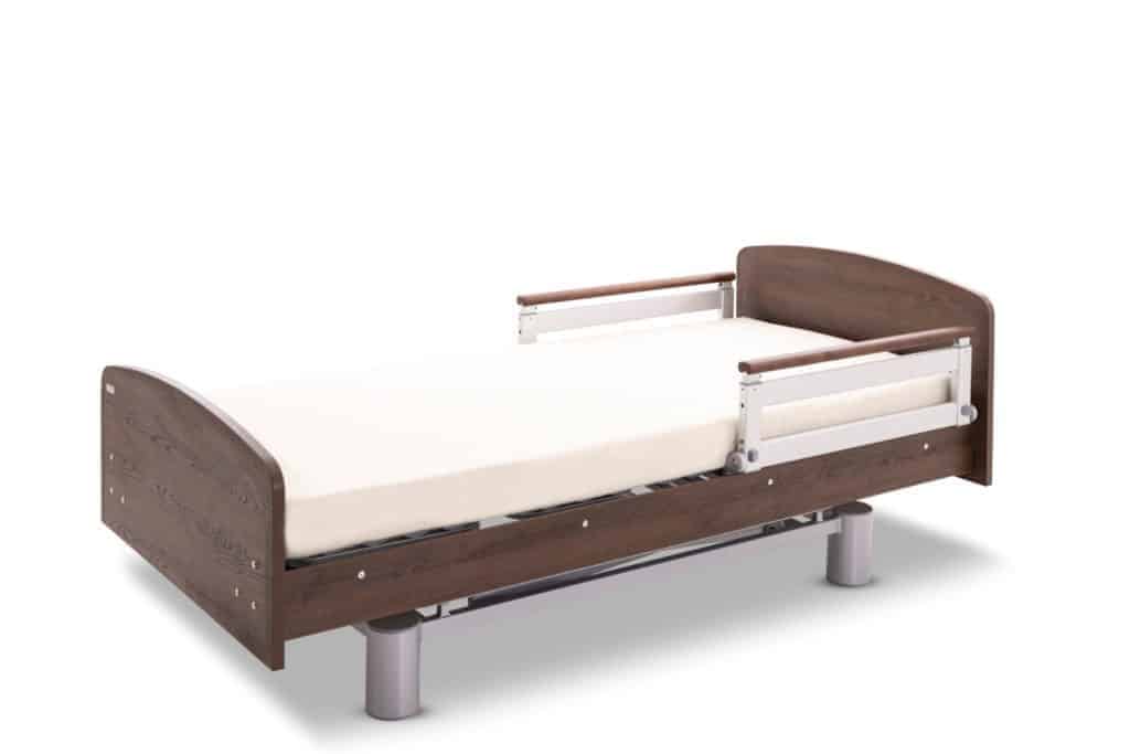 a wooden bed frame with a mattress on top of it.